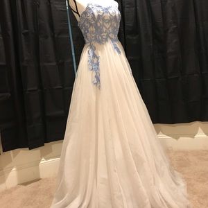 A blue and white strapless prom dress.
